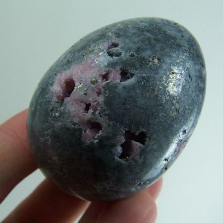 Rhodochrosite in matrix carved egg from Colorado