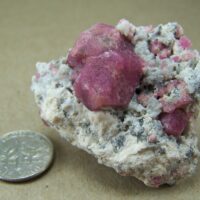 Garnet var. “Raspberry” Grossular crystals in Rhyolite from Lake Jaco, Mexico