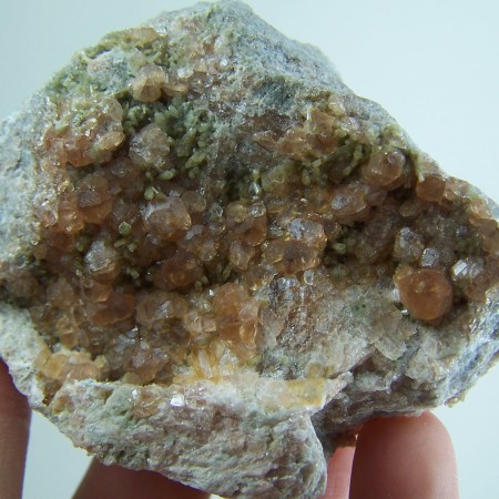 Hessonite Garnets on matrix from Jeffrey Mine, Quebec, Canada