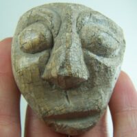 Fossilized Mammoth tusk mask carving