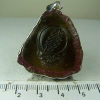 “Steal Your Face” carved Elbaite Tourmaline pendant